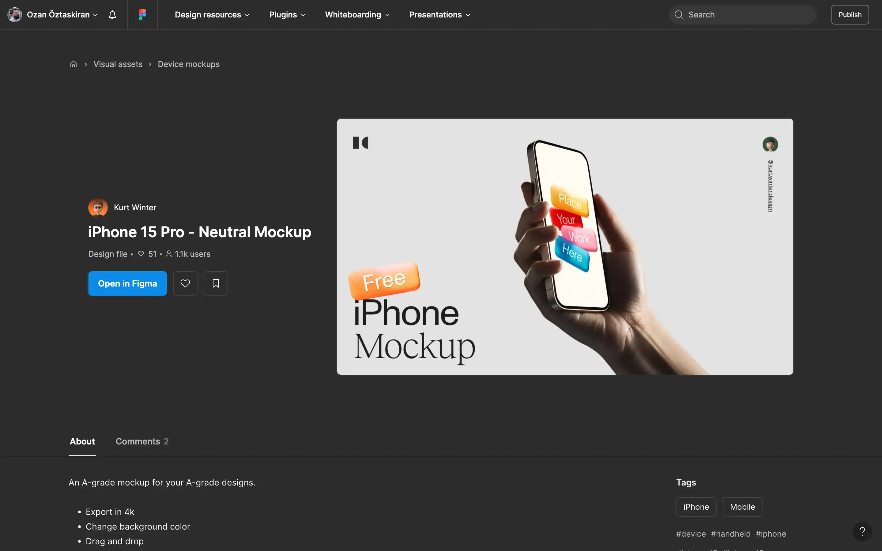 Hand holding iPhone 15 Pro mockup for design