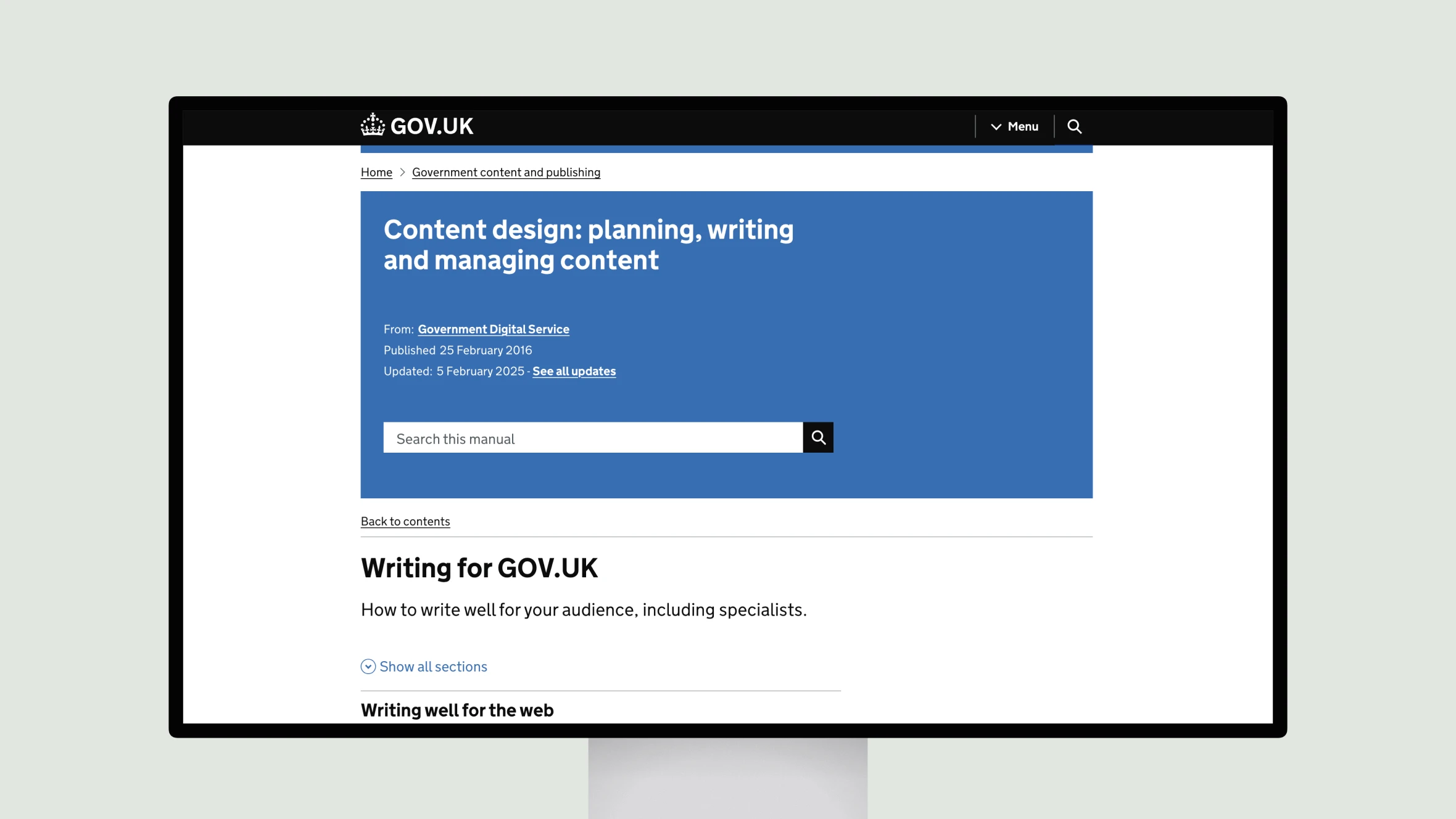 A computer monitor displays a webpage from GOV.UK. The main section features a blue header titled "Content design: planning, writing and managing content." Below this, there is information about the publication, including the source, publication date, and an update date. A search bar is present for searching the manual. The page includes a section titled "Writing for GOV.UK," which provides guidance on writing effectively for various audiences. There are options to show all sections and a note about writing well for the web. The overall layout is clean and organized.